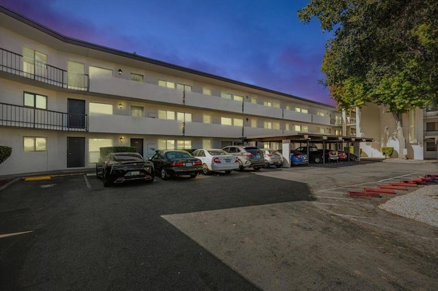 view of outdoor building at dusk