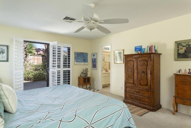 carpeted bedroom with ceiling fan, connected bathroom, and access to exterior