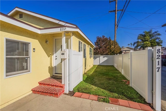 view of home's exterior featuring a yard