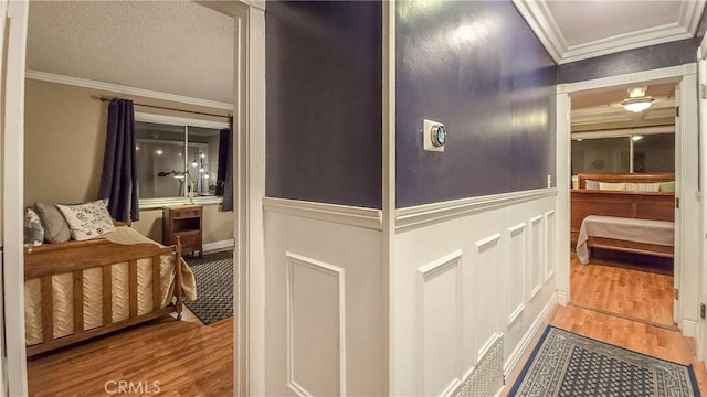 details featuring hardwood / wood-style floors and ornamental molding