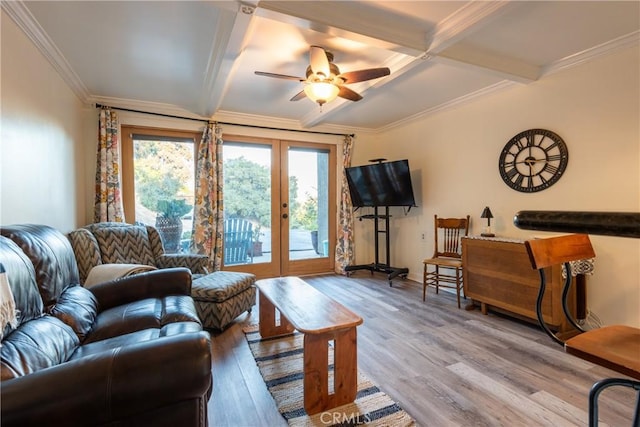 living room with french doors, wood-type flooring, and ornamental molding