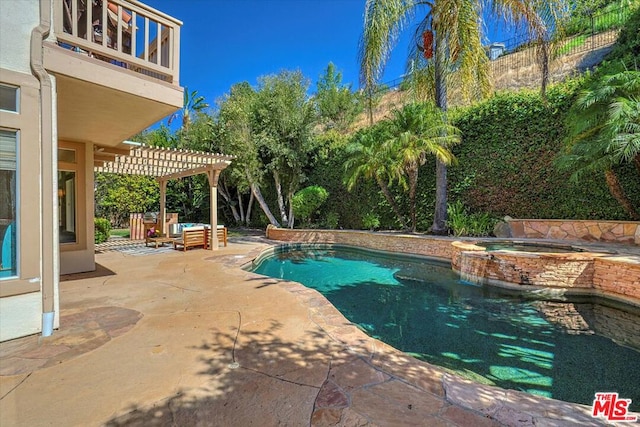 view of pool with a pergola, an in ground hot tub, and a patio