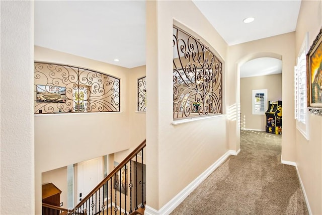 hallway with carpet