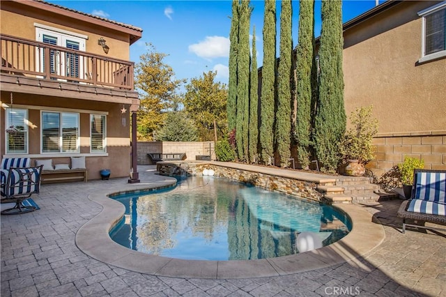 view of pool with a patio