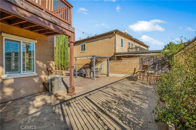 view of patio / terrace featuring cooling unit