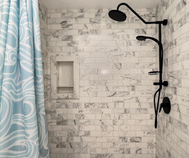 bathroom featuring a shower with curtain