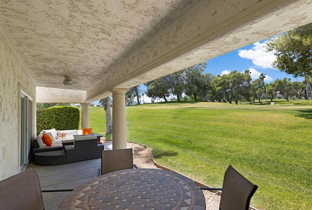 view of patio / terrace with ceiling fan and an outdoor hangout area