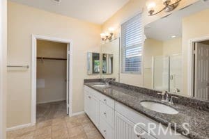 bathroom featuring vanity and tile patterned floors