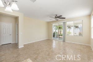 empty room featuring ceiling fan