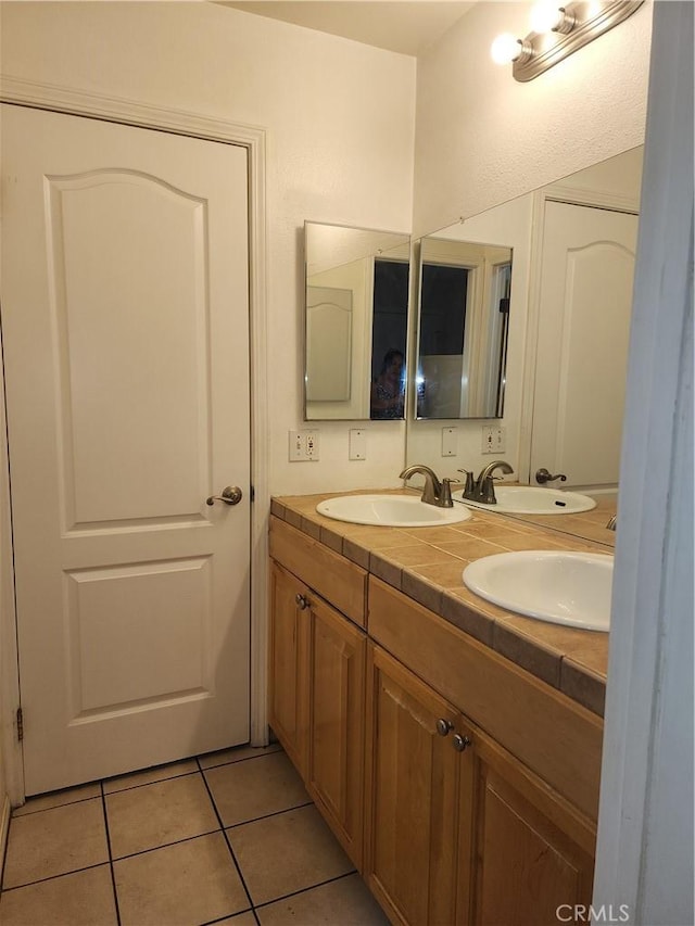 bathroom featuring vanity and tile patterned floors