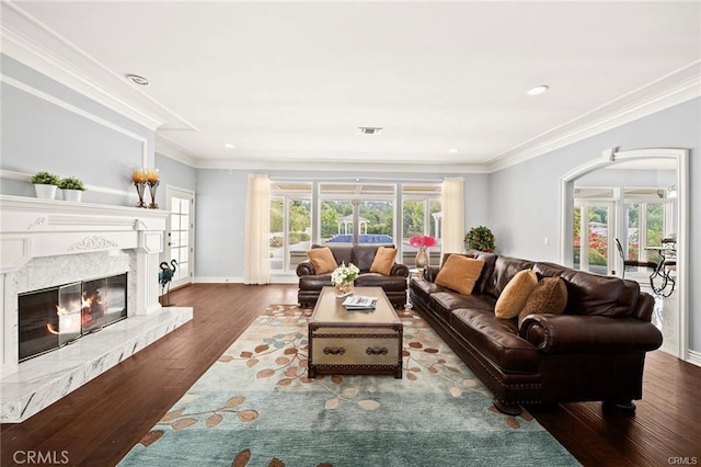 22427 Steeplechase Ln, Diamond Bar, CA 91765 - living room featuring ornamental molding, wood finished floors, recessed lighting, a premium fireplace, and arched walkways