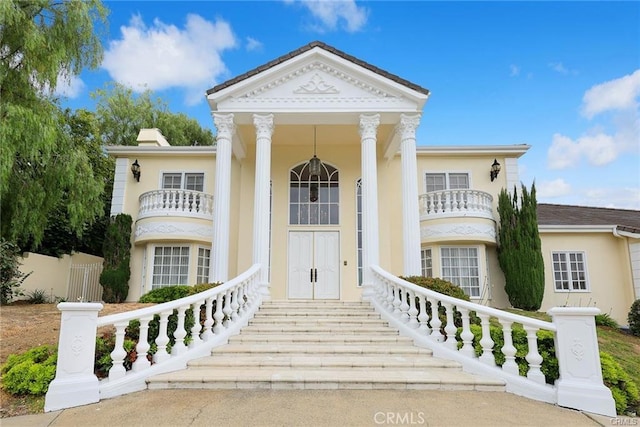 22427 Steeplechase Ln, Diamond Bar, CA 91765 - neoclassical / greek revival house featuring a balcony and stucco siding