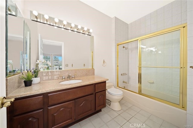 22427 Steeplechase Ln, Diamond Bar, CA 91765 - full bath featuring tile patterned flooring, toilet, vanity, and combined bath / shower with glass door