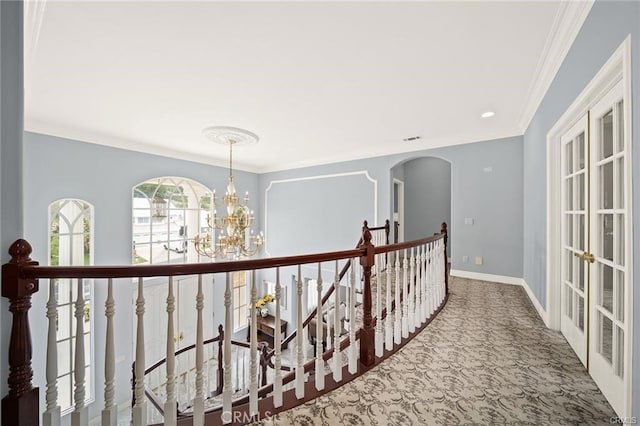 22427 Steeplechase Ln, Diamond Bar, CA 91765 - hallway with an upstairs landing, carpet, arched walkways, a chandelier, and ornamental molding