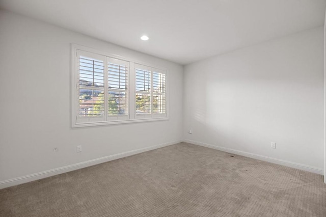 view of carpeted spare room