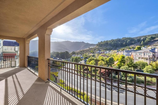 balcony featuring a mountain view