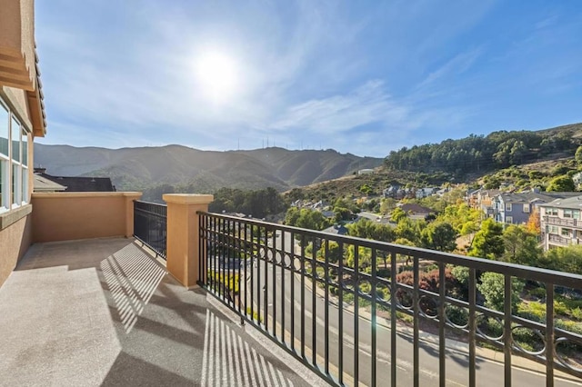 balcony featuring a mountain view