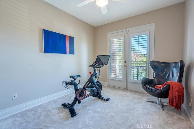 exercise room featuring french doors, carpet floors, and ceiling fan