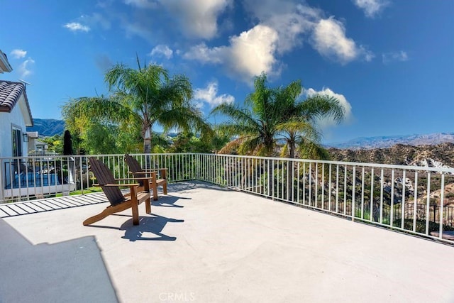 view of patio featuring a mountain view