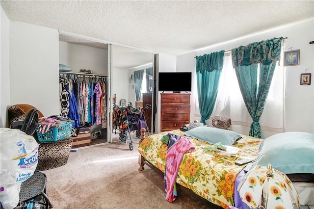 bedroom with multiple windows, carpet flooring, and a closet