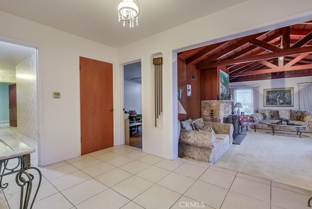 carpeted living room with lofted ceiling