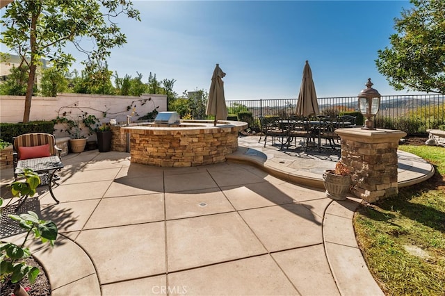 view of patio with area for grilling