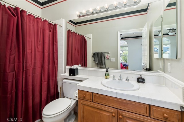 full bathroom featuring vanity, shower / bath combo, toilet, and crown molding