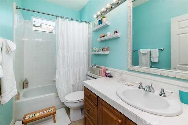 full bathroom featuring tasteful backsplash, vanity, shower / tub combo, and toilet