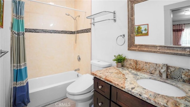 full bathroom featuring shower / bathtub combination with curtain, vanity, and toilet