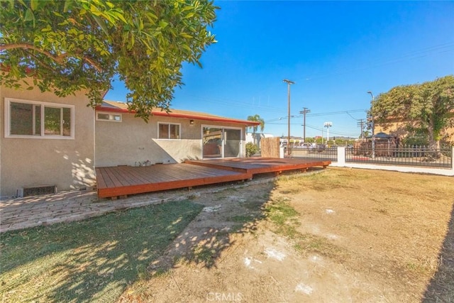 view of yard with a deck