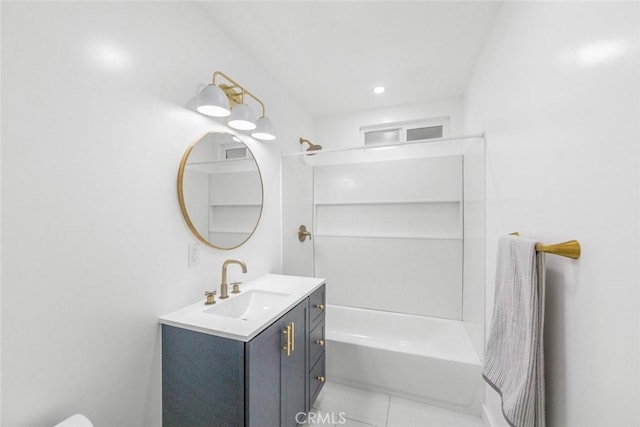 bathroom with vanity, shower / bath combination, and tile patterned floors