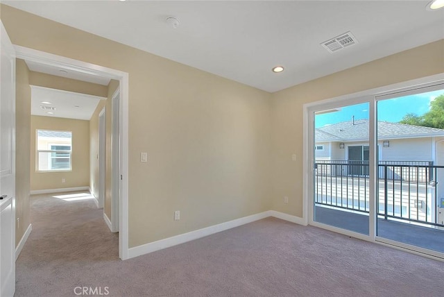 view of carpeted spare room