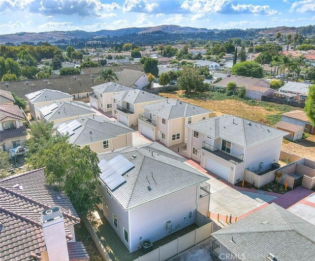 drone / aerial view featuring a mountain view