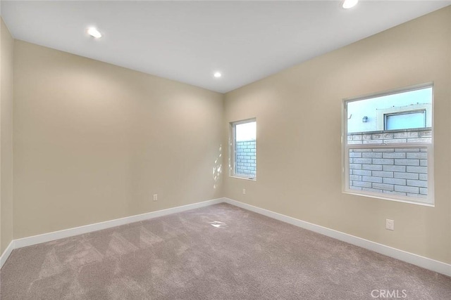 view of carpeted spare room