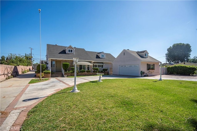 view of front facade with a garage and a front lawn