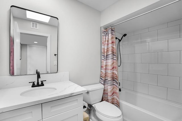 full bathroom featuring shower / bathtub combination with curtain, vanity, and toilet