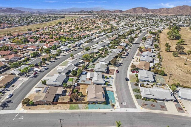 drone / aerial view featuring a mountain view