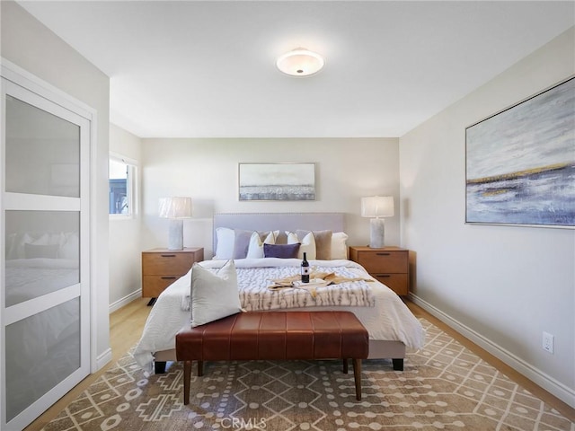 bedroom featuring hardwood / wood-style floors