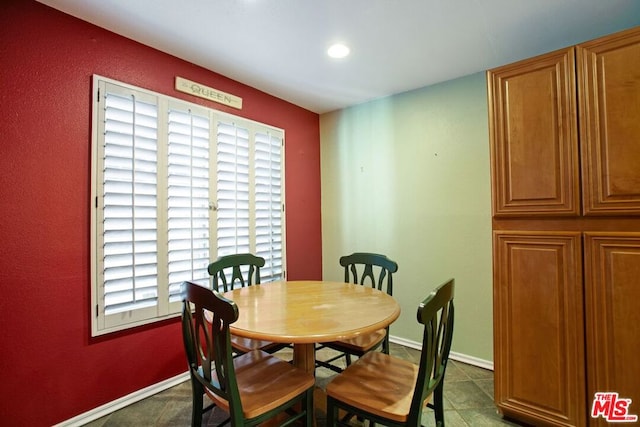 dining area featuring a wealth of natural light