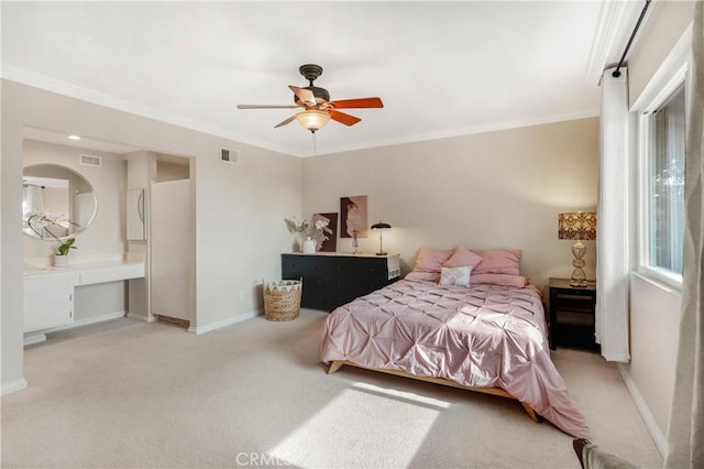 bedroom featuring ceiling fan, light colored carpet, and ornamental molding