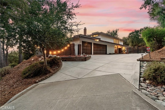 view of front of property with a garage