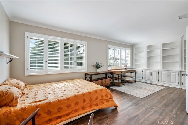 bedroom featuring hardwood / wood-style flooring and ornamental molding