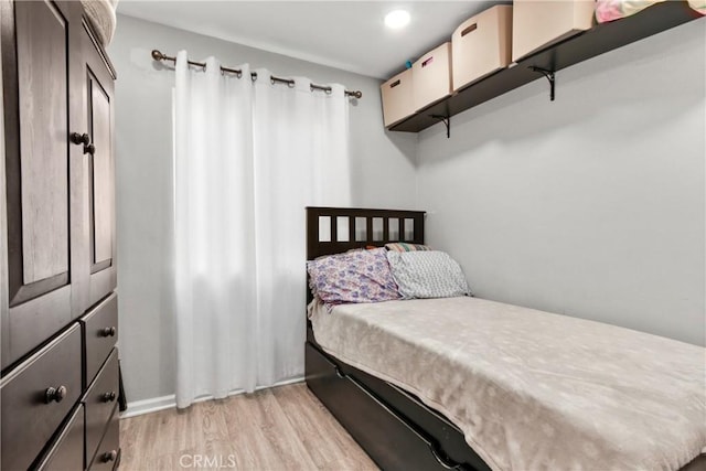 bedroom featuring light hardwood / wood-style floors