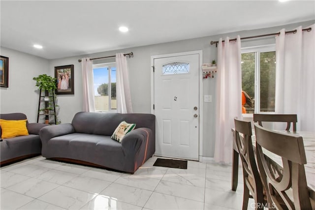 living room with a healthy amount of sunlight