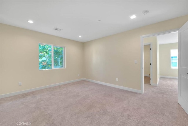 view of carpeted spare room