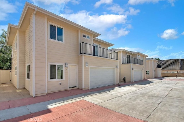 view of front of property with a balcony