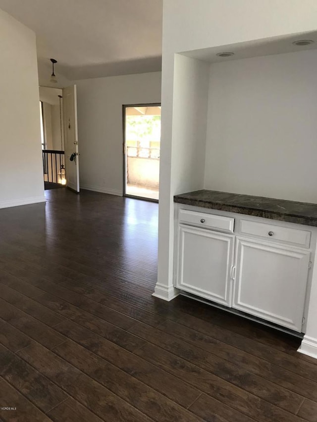 empty room featuring dark hardwood / wood-style floors