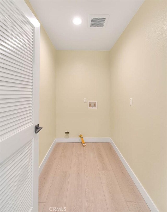 640 W Grand Ave, Pomona, CA 91766 - laundry room with washer hookup and light hardwood / wood-style floors