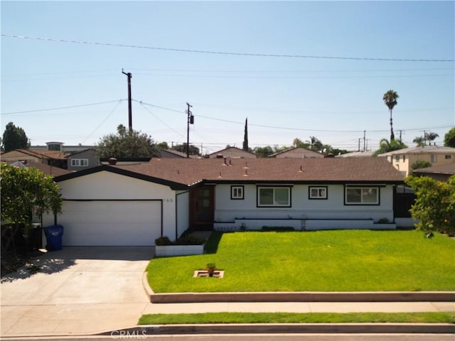 ranch-style house with a garage and a front yard