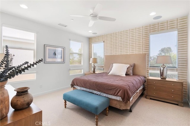 carpeted bedroom featuring ceiling fan